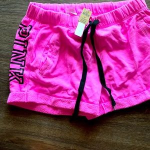 New pink shorts, size small